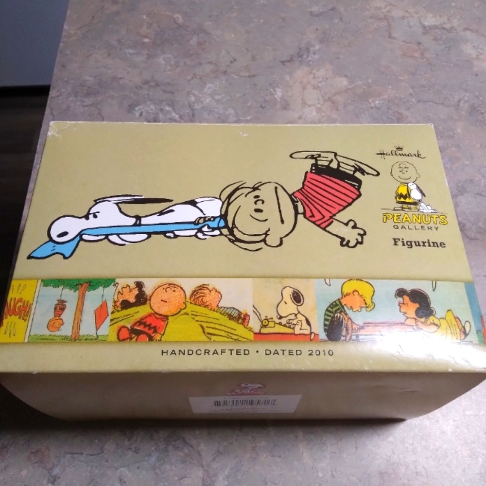 Peanuts Hallmark Gallery Figurine" When life takes you for a ride,hang on tight.